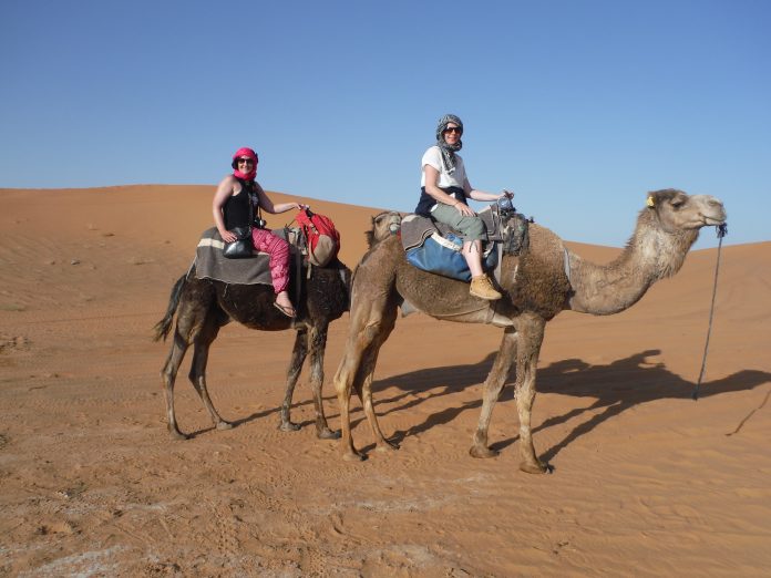 Camel ride in the Sahara Desert, Morocco.